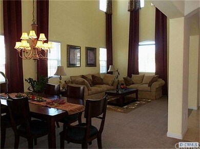 Living Room and Dining Room with Custom Drapes