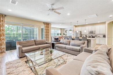 Living room facing kitchen and dinning room. Glass
