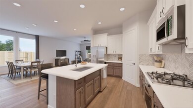 Kitchen featuring light wood-style floors, recess