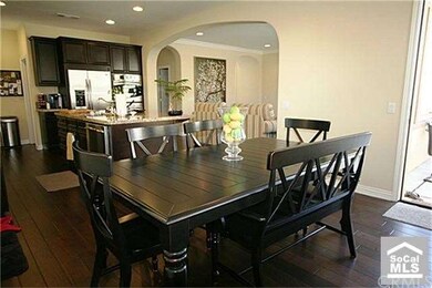 Formal Dining Room opens to Kitchen and Family Roo