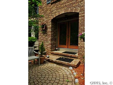 Patio. The beautiful front door is hidden behind t