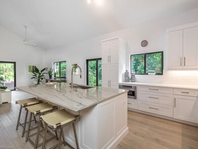 White Shaker, soft-close cabinetry, quartzite coun