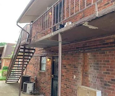 View of patio / terrace featuring stairway and central air condition unit