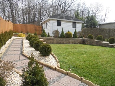 Beautiful stepping stone walkway to garage
