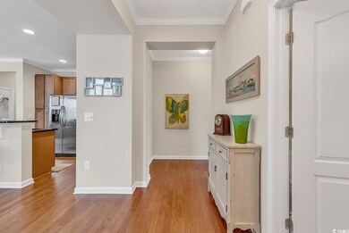 Hallway featuring light hardwood / wood-style floo