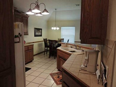 Kitchen. Kitchen is open to dining area and living