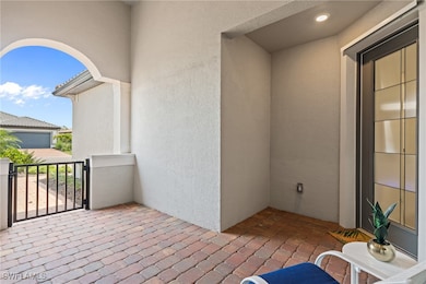 View of patio / terrace with a balcony