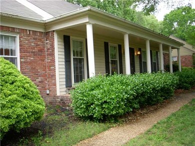 Large welcoming front porch. Notice the brick and 