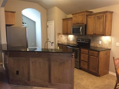 Granite countertops and stainless steel appliances