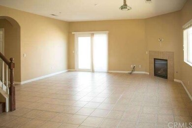 The Living Room with Fireplace.