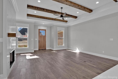 Foyer with recessed lighting, wood finished floors