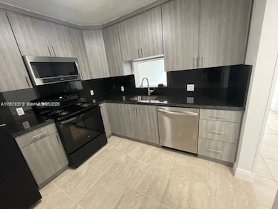 Capri Gardens Condominiums unit C409, Miami, FL 33161 - photo 6