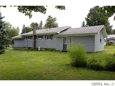 Exterior Back. New asphalt shingle roof in 2004.