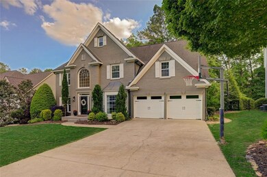 View of front facade featuring concrete driveway, 