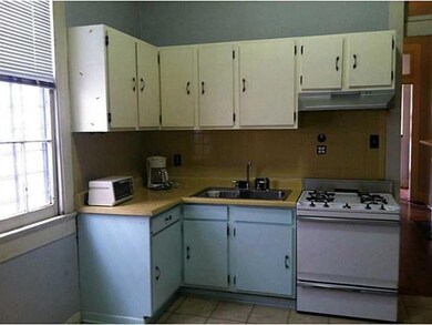 Kitchen. Charming kitchen with wood cabinets