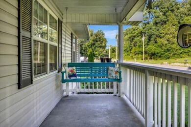 Front porch with swing for relaxing