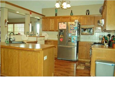 The Kitchen opens to both the living and dining ar