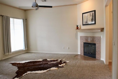Unfurnished living room featuring crown molding, c