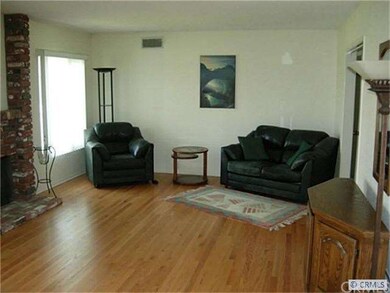 One view of the living room with hard wood floors