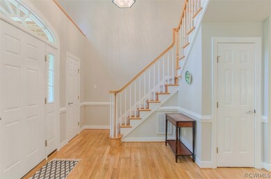 Two-story foyer, hardwood floors