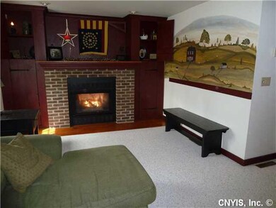 Living Room. Beautiful Mural. Can you see the buil