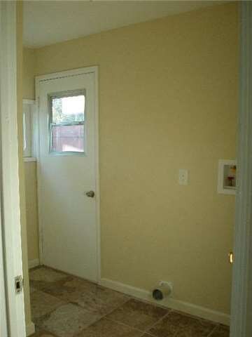 Laundry room has separate entrance & is off Master