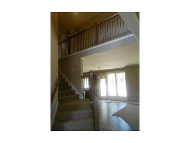 Open stair case with catwalk on the second level