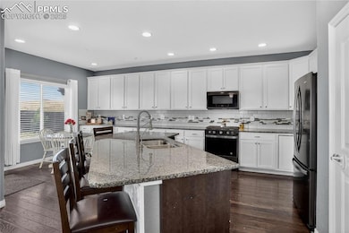 9889 Wando Dr, Colorado Springs, CO 80925 - photo 7