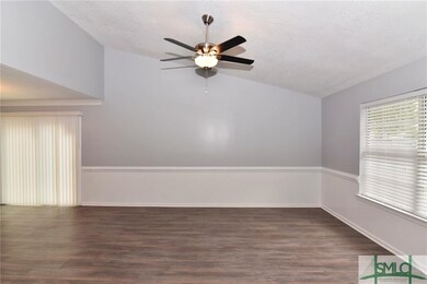 LIVING ROOM TO SIDE PATIO DOOR