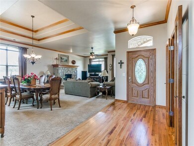 Entry.  The formal living with fireplace and forma