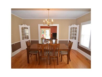 Dining Area. Formal dining room, built in corner c