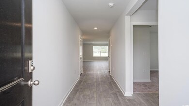 Hall featuring hardwood / wood-style floors
