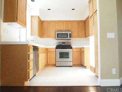 Sunlight floods the open kitchen floorplan.