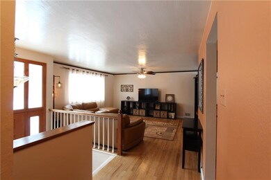 A warm & inviting entry into this lovely home