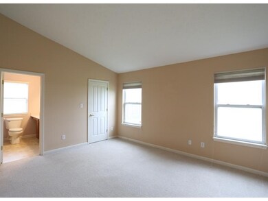 Master Bedroom. The master suite features a vaulted ceiling, plant shelf and walk-in closet.