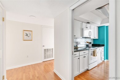 Laminate flooring throughout the condo make it eas