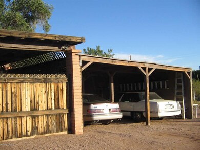 Carport area, room for 2!