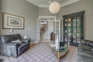 Featured crown molding and designer carpet.