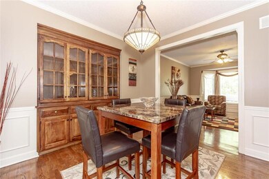 Dining area offers built in china cabinet.