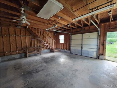 Garage featuring ceiling fan