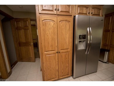 The home is rich with natural woodwork, including 