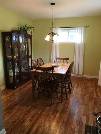 Dining area opens to the kitchen.  Lovely hardwood