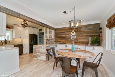 Dining with Shiplap Wall & Bar Serving Area