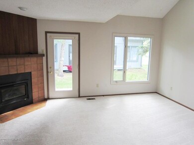 Living Room w/ Fire Place