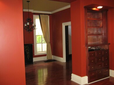 Sitting room opening into dining room