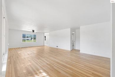 Original hardwood refinished floor.