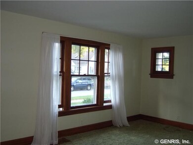 Living Room. Large gumwood trim window.