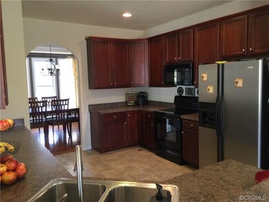 Kitchen overlooking formal dining