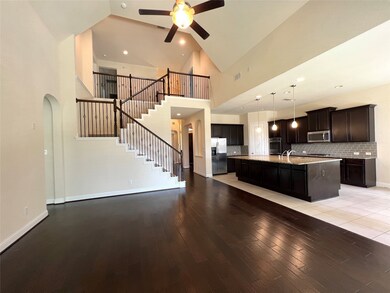 Overview of family room and kitchen.
