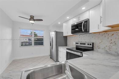 12950 SW 13th St unit 309D, Pembroke Pines, FL 33027 - photo 7